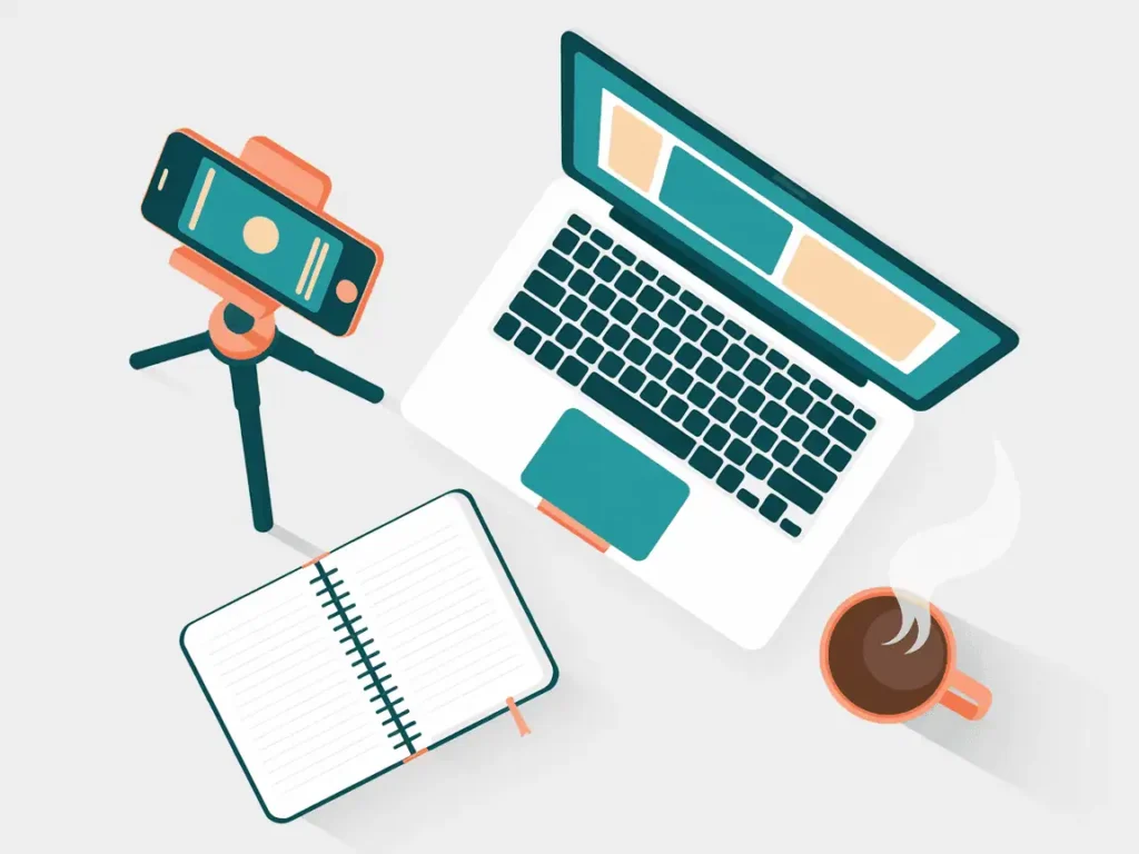 5 Steps to Building a YouTube Funnel for Teachers Without Burnout 6 How to monetize educational videos on YouTube: Overhead view of a teacher's workspace with laptop, phone tripod, notebook, and coffee.